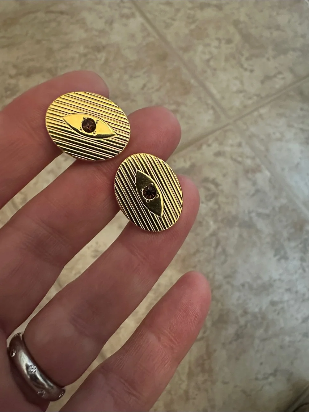 Gold Oval Cufflinks with Garnet Center